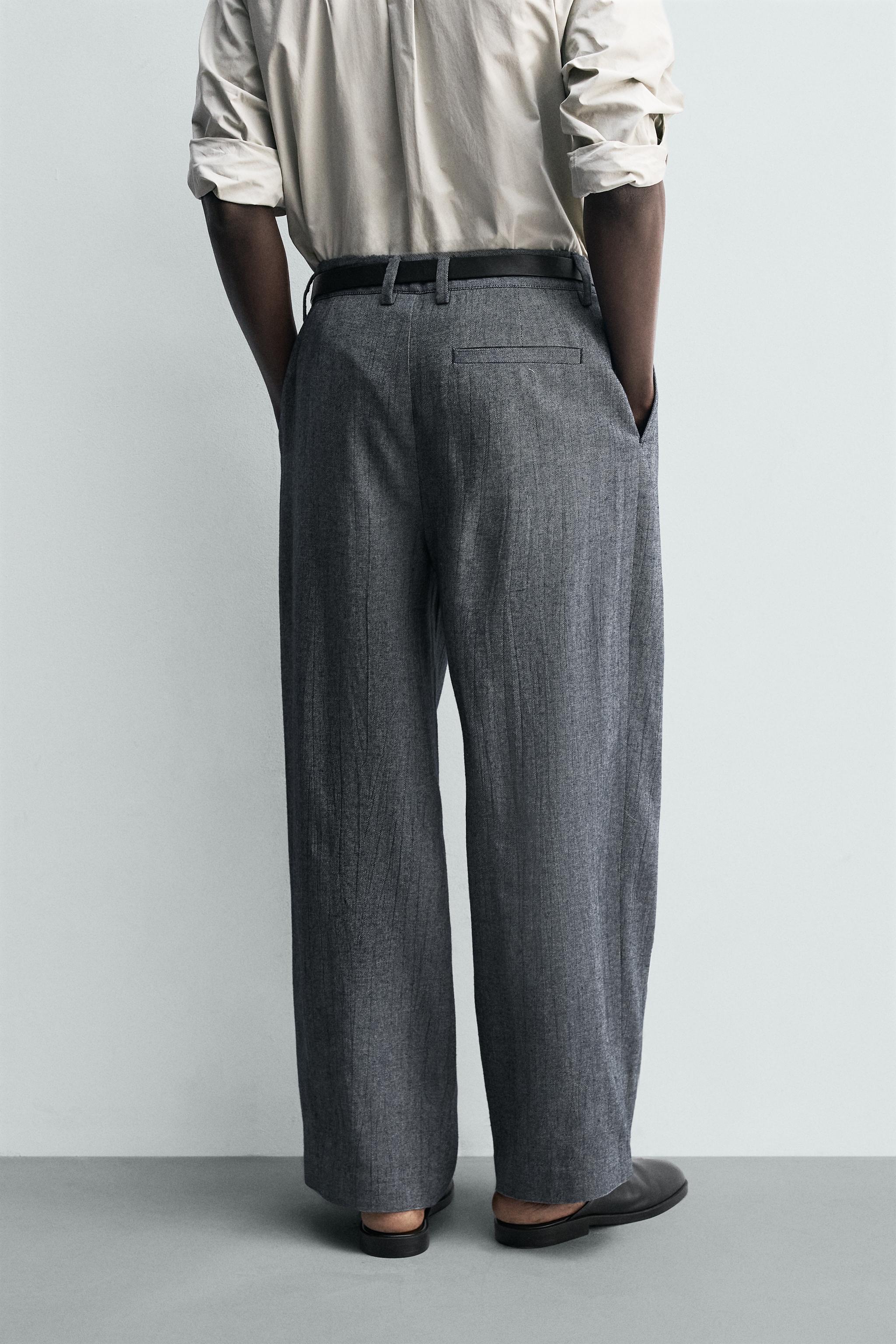 PLEATED RELAXED FIT PANTS